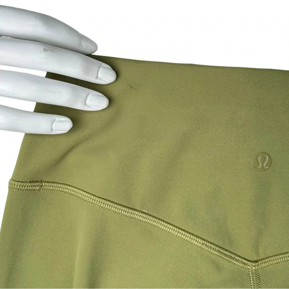 Lululemon Nulu and Crisscross Mesh Stirrup Tight‎ Bronze Green W5ERXS Size 6